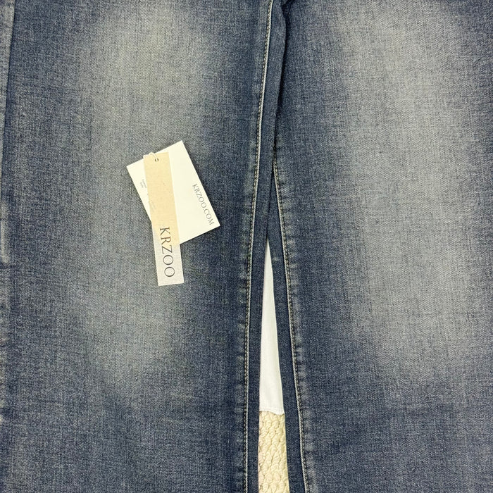 Washed and distressed denim pants
